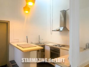 Offene Küche im Loft in Mönchengladbach mit moderner Ausstattung